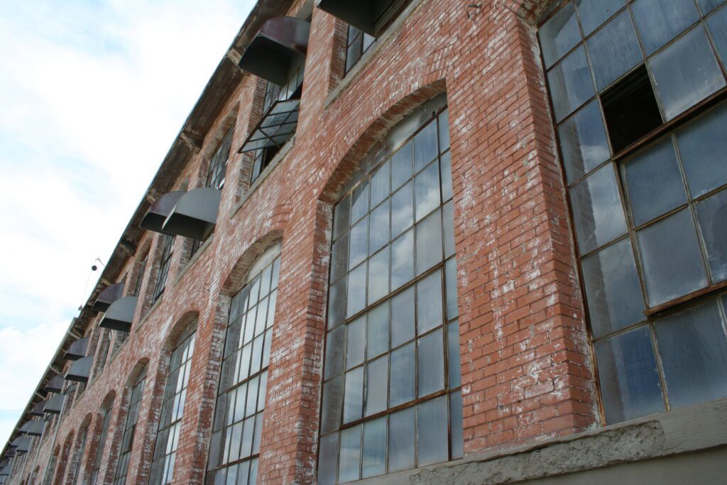 Windows,of,an,old,cotton,mill,building